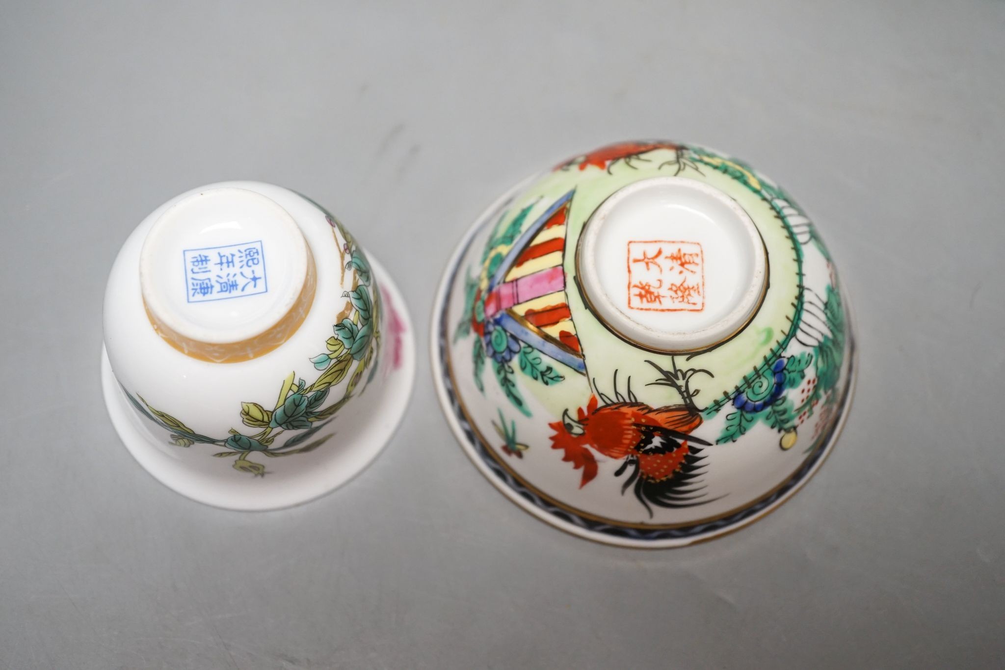 A pair of Chinese famille rose ‘peach’ bottle vases, 17cm, a ‘phoenix’ jar and cover, two porcelain cups and a boxed set of bamboo tallies or counters (6)